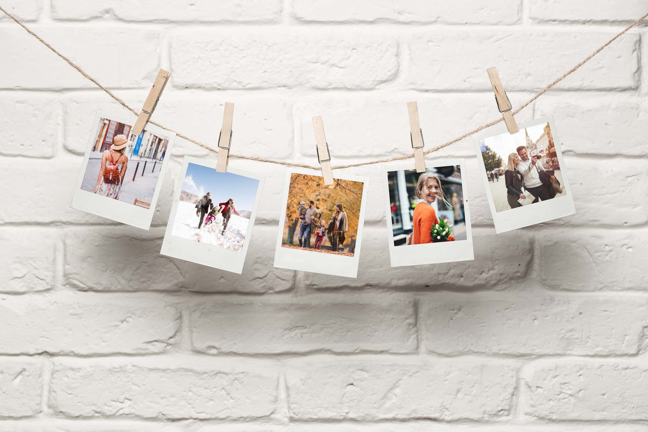 Fotos an Girlande aufgehängt als Fotogeschenke Idee