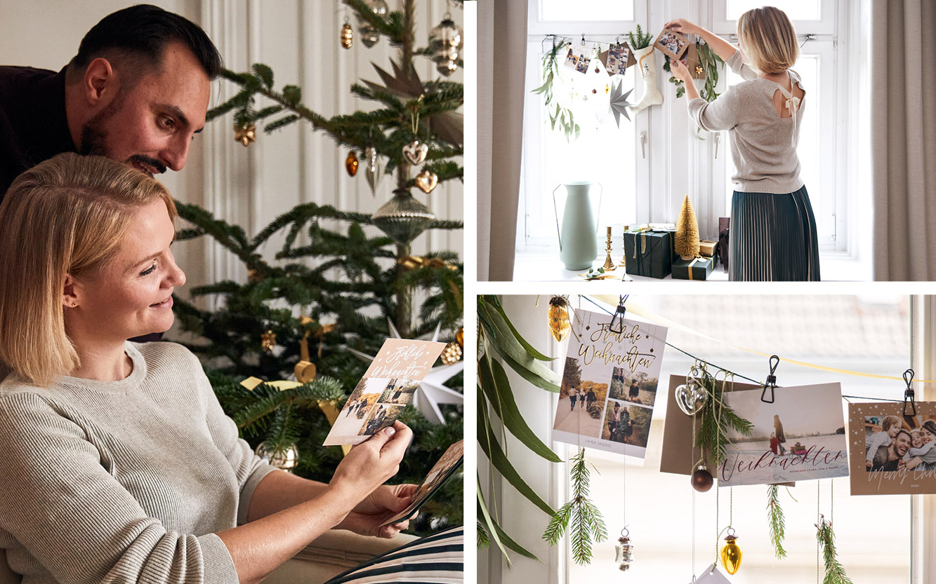 Classy Christmas, Weihnachten zu Hause, Paar hängt Weihnachtskarten auf.