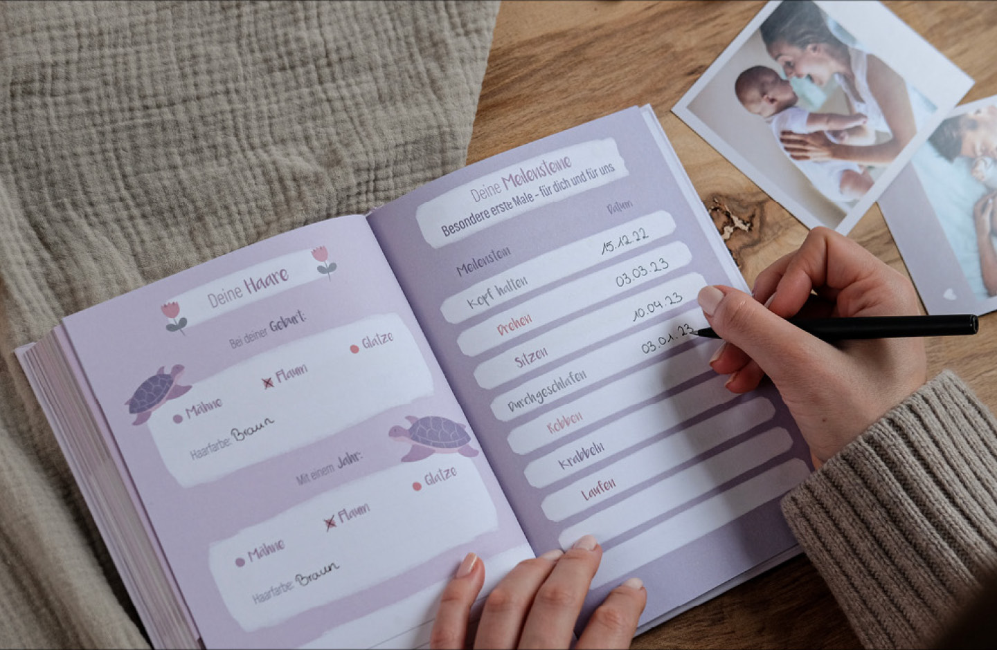 Mutter trägt Daten ihres Babys in Babytagebuch ein
